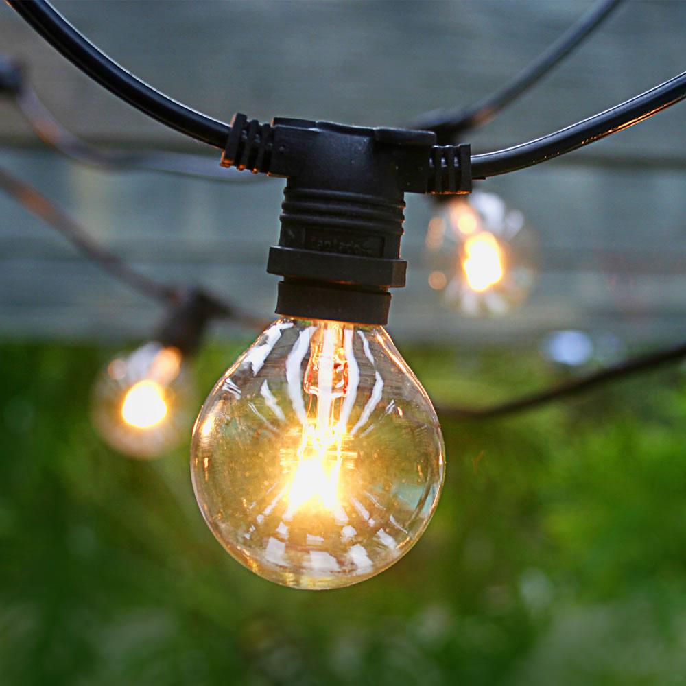 50 Socket Weatherproof Outdoor Commercial String Light Set, Clear Globe Bulbs, 54 FT Black Cord w/ E12 C7 Base, Weatherproof - Luna Bazaar | Boho & Vintage Style Decor